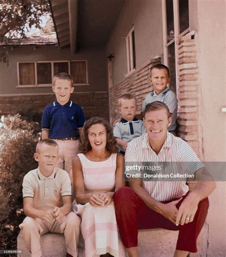 Actor Chuck Connors at home with his wife Elizabeth Jane Riddell