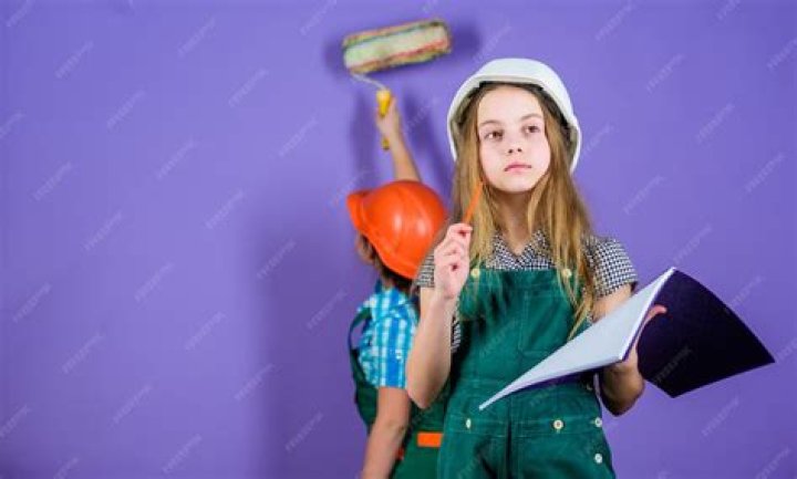 Kids happy renovating home. Home improvement activity. Kids girls with